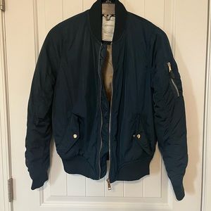 Medium sized Bershka emerald green jacket from Mall of Berlin.